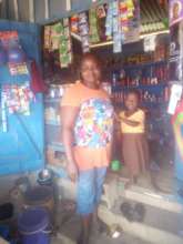 Mabel and her daughter in her shop.