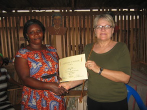 Merry presents certificates for timely loan payments!