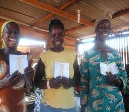 Group members display savings books