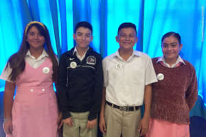 Students wearing their mangrove guardian badges.