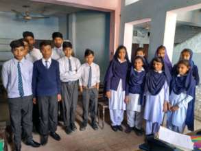 Simran with her fellow secondary school students