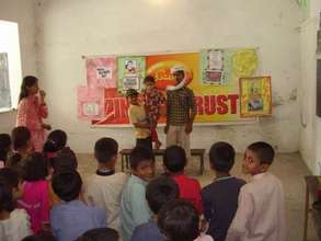 Students present a skit for Father's Day
