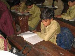 Help working children in Pakistan go to school