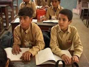 Help working children in Pakistan go to school