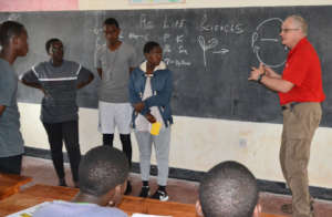 Bob conducting a student training in Rwanagana.