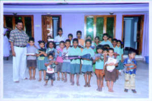 children receiving clothes