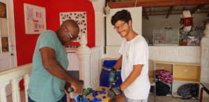 Giacomo and Paul preparing the bottle caps