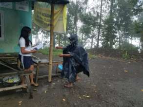 Although rain, teacher still visiting students