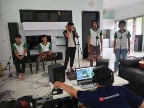 Recording songs for their campaign