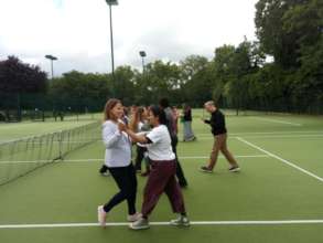 Local carer Sean leads a dance class at festival!
