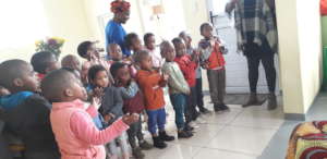 Children celebrate their new school