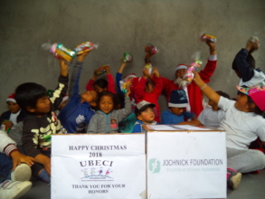 The children were  happy to get Christmas gifts!