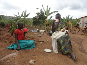 Margaret and the family taking their porridge