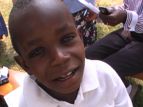 Yusuf Mubiru happy after receiving 20 kgs of rice