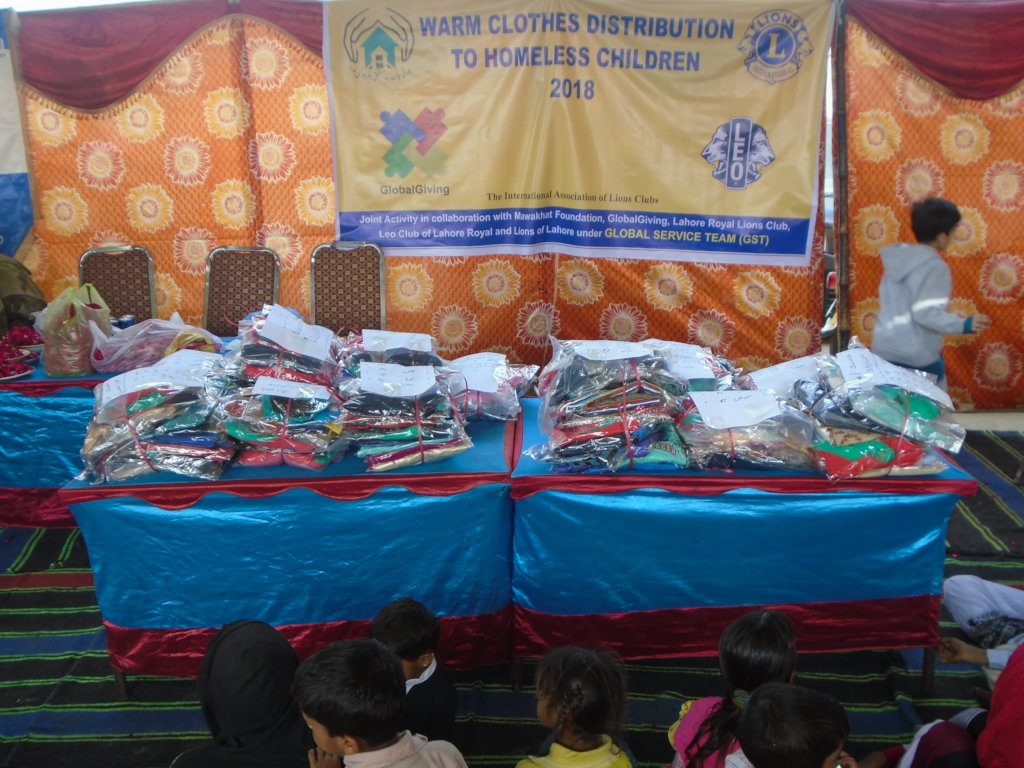 warm clothes and blanket for 100 homeless children