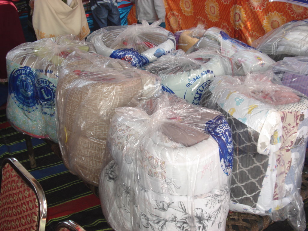 warm clothes and blanket for 100 homeless children