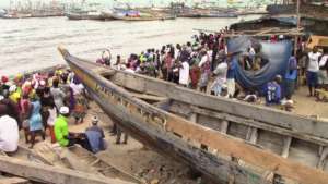 Crowd gathers at the beach at Funkia Wharf