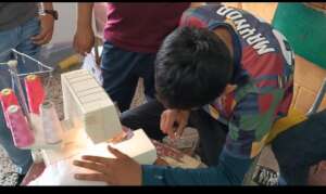 Working together to hone sewing skills