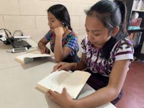 Our future lawyers reading literature from library