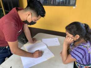 Diego helping Ana with her middle school math home
