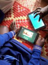 Children learning on tablets in Kampala, UGANDA