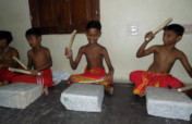 Musical instruments for 17 slum children in India