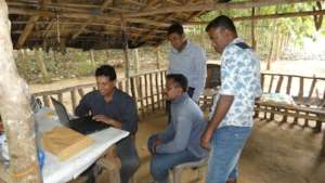 Field team working with officials