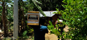 Our team carrying ration packs to the recipients