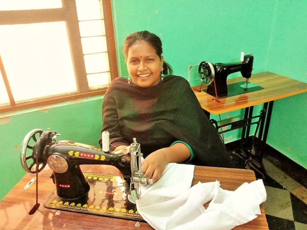 Banu at her sewing machine