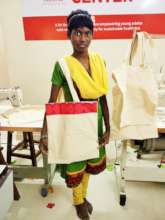 Posing with a cloth bag she made