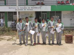Students of the program receiving their scholarshi
