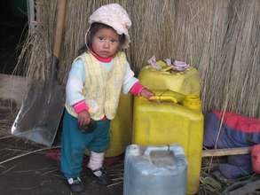 Little child with water jug