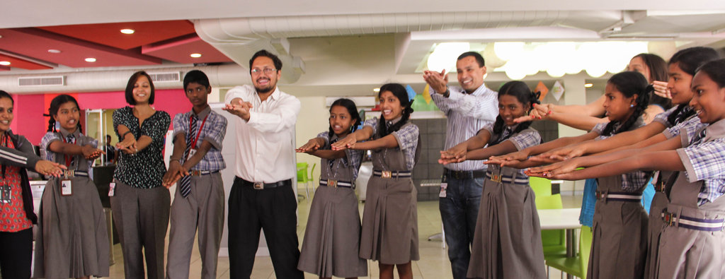 Young People with Qualcomm employees at a Fun Day