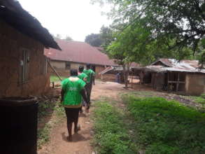 Team and villagers inspecting identified points