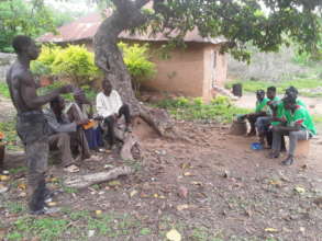 Our team and some villagers discussing