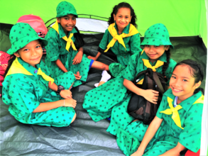 Girl Scouts happy in their new tent!