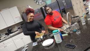 HALO youth & staff making dinner