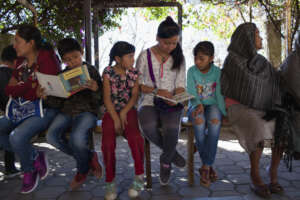 Children reading at Atzin Centre