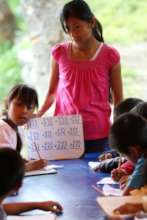 Lina helps children with math as community service