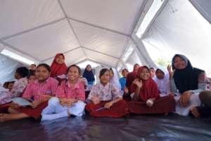Children have class in the temporary school