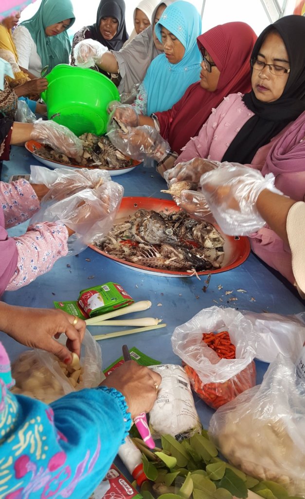 local women processing fish catches