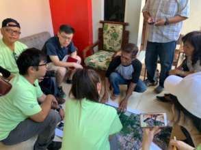 MSM staff discussing with the school teachers