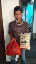 Local resident receiving supplies