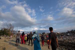 People wear masks in soil liquefaction area