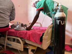 baby transported on portable oxygen