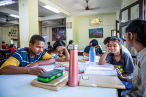 Our children studying at home in the Dining Room.