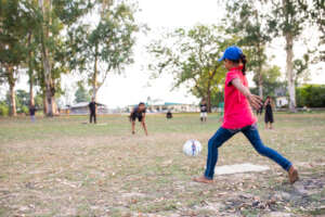 A game of kickball underway.