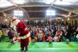 Santa throwing sweets out to the kids at Christmas
