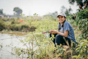 Jyotika fishing in our pond