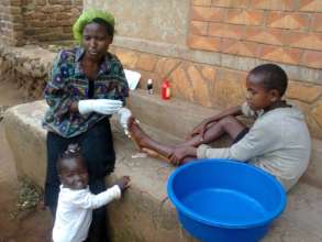 First aid to one of the community children